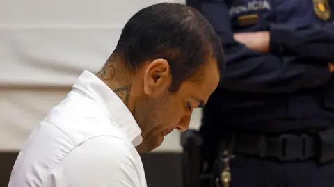 Dani Alves Breaks Down in Tears in Court During Rape Trial